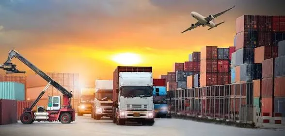 Road freight truck moving through a container depot